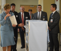 KATELYN HIBBARD/Sun-Gazette Leaders of Geisinger Health toured the newly dubbed Geisinger Jersey Shore Hospital, handing out welcome baggies filled with ID card holders, pens and cookies to doctors, nurses and other hospital staff. From left are Lynn Miller, Geisinger executive vice president and chief administrative officer of clinical enterprise; Brock Trunzo, Geisinger marketing and public relations director; David Shannon, Jersey Shore president and CEO; Joe Stender, Geisinger media specialist; Tom Sokola, Geisinger central region chief administrative officer; and Jaewon Ryu, Geisinger executive vice president and chief medical officer.